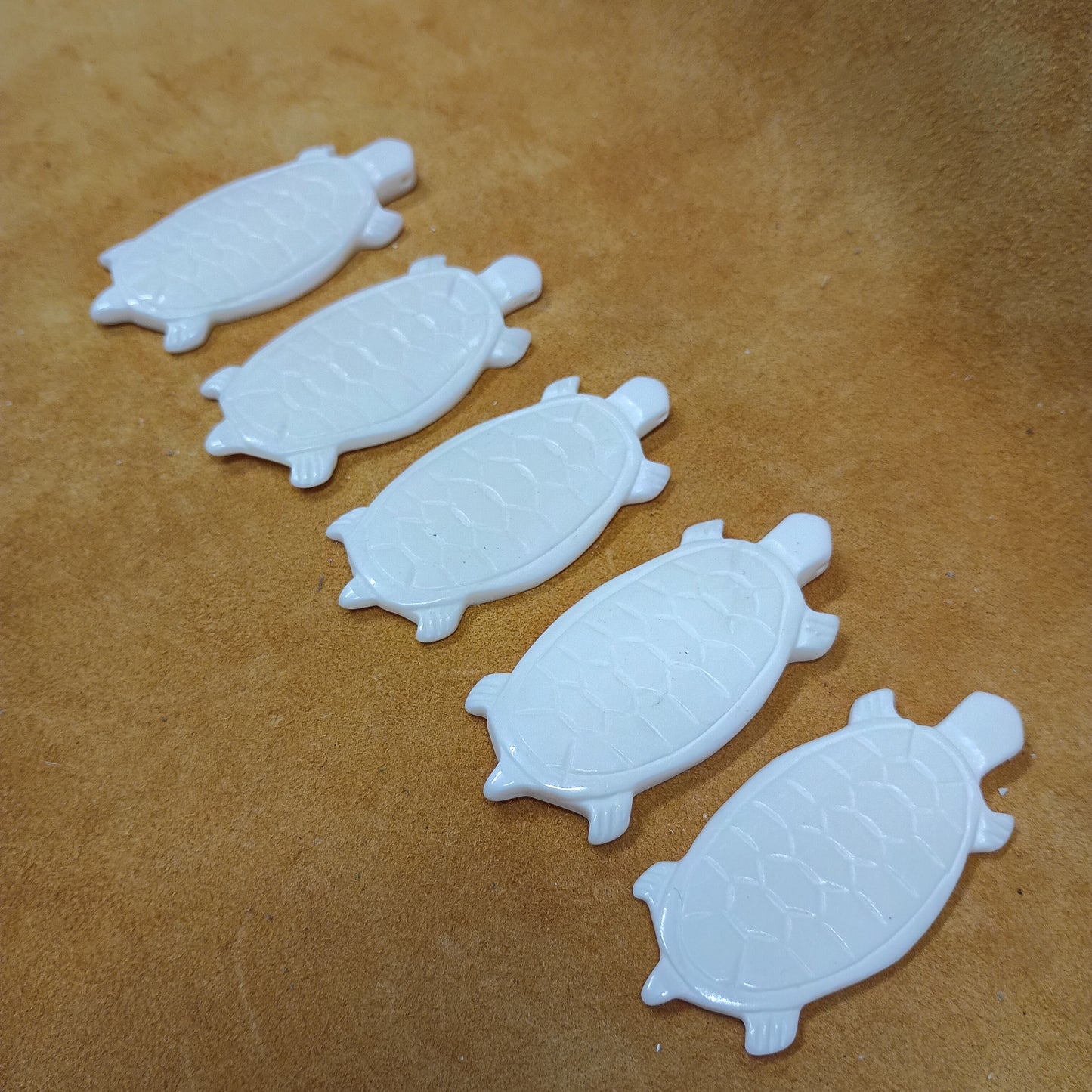 Carved Turtle Bone Pendants