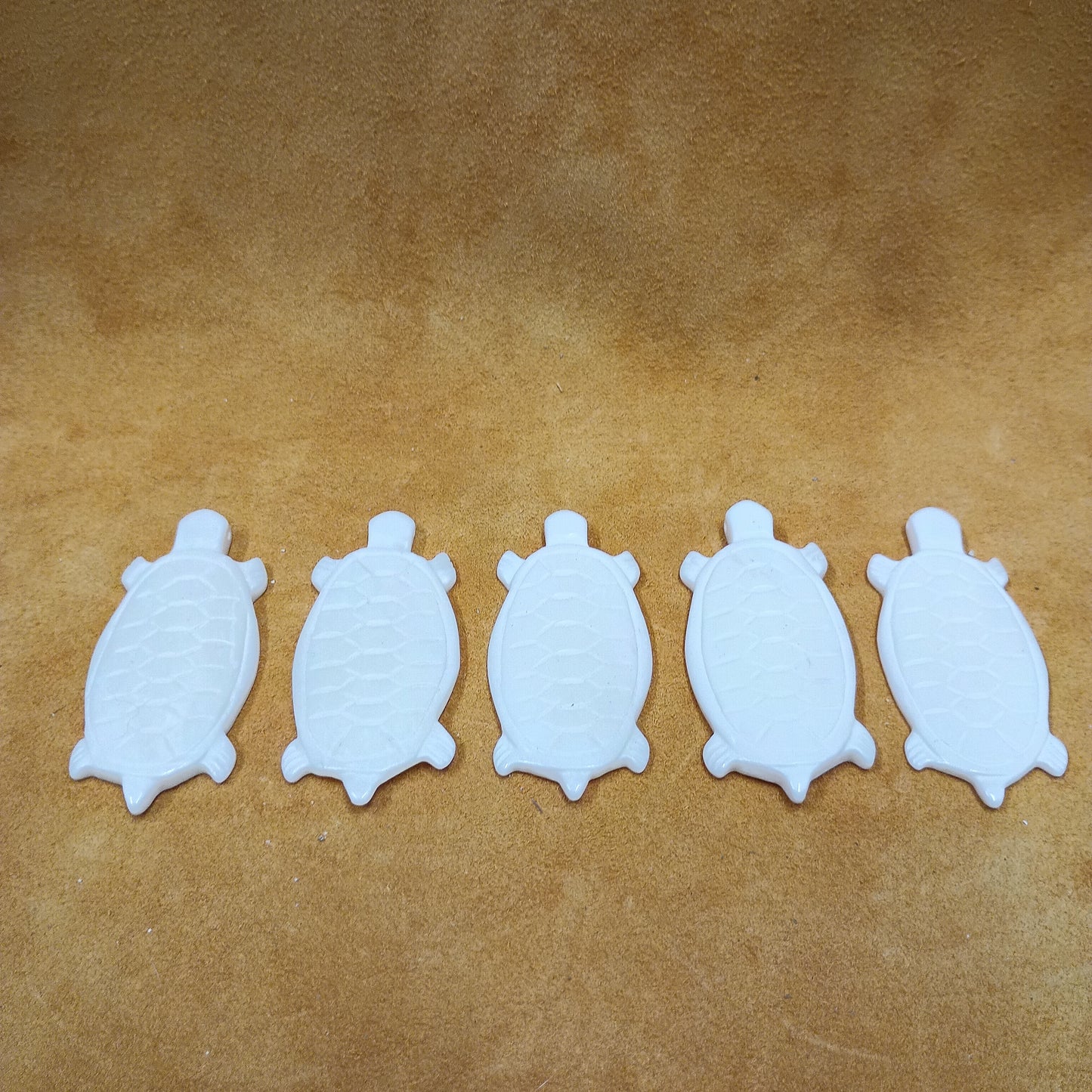 Carved Turtle Bone Pendants