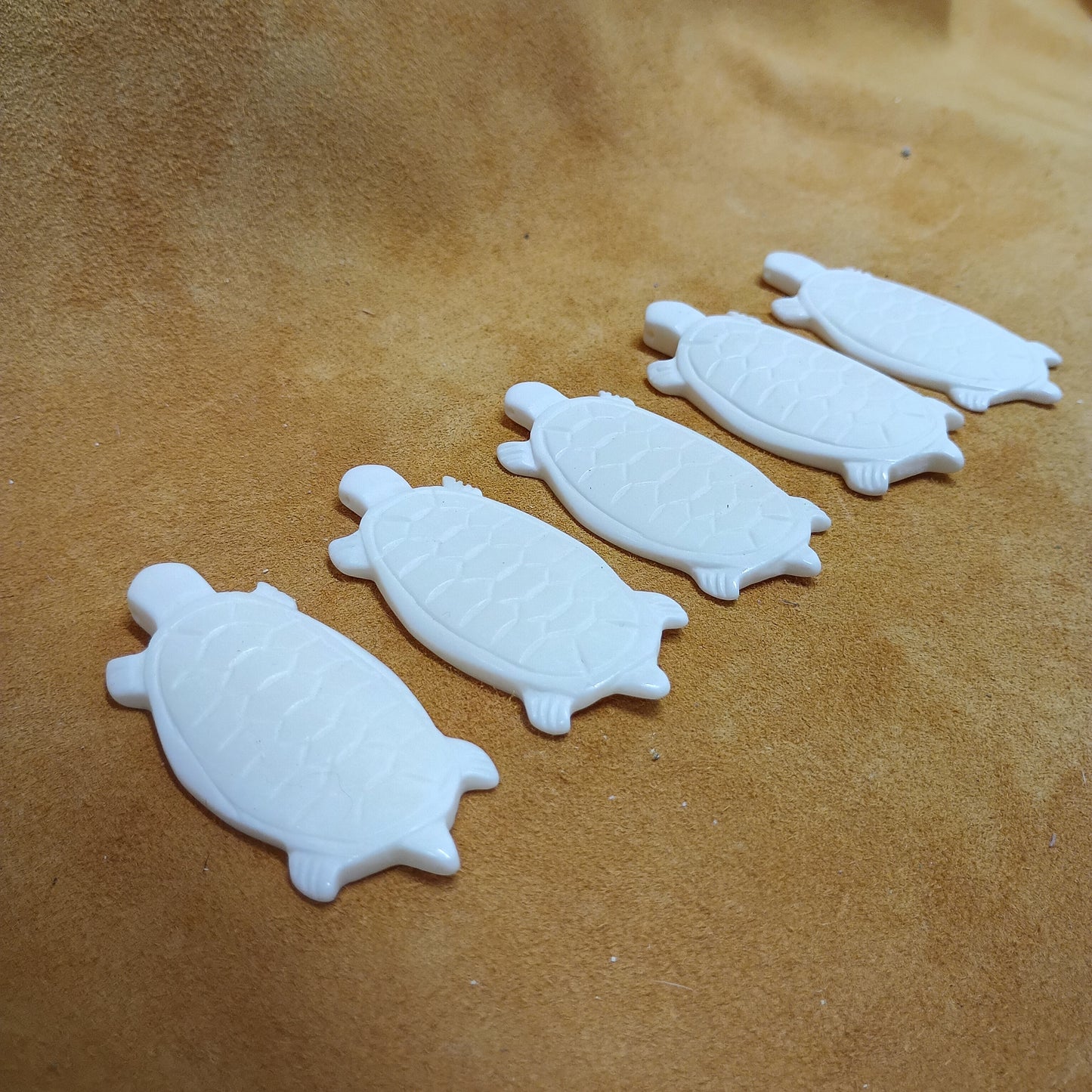 Carved Turtle Bone Pendants